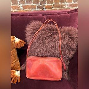 Authentic vintage Coach leather purse. Brick red, distressed